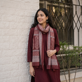Maroon Bagh Hand Block Printed Merino Woollen Stole, worn by a woman, AI visual of the stole, iTokri