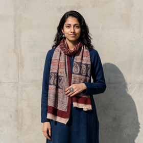 Maroon Bagh Hand Block Printed Woollen Stole, worn by a woman, AI visual of the stole, iTokri