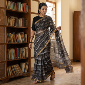Brown Bagru Block Printed Kota Doria Cotton Zari Border Saree, draped and worn by a woman, AI visual of the saree, iTokri