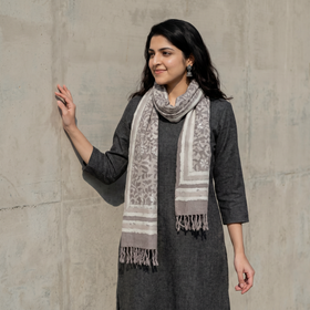 Grey Bagru Dabu Hand Block Print Pure Merino Wool Handwoven Natural Dyed Stole, worn by a woman, AI visual of the stole, iTokri