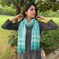 Blue Bagru Dabu Hand Block Print Pure Merino Wool Handwoven Natural Dyed Stole, worn by a woman, AI visual of the stole, iTokri