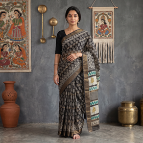 Black Bagru Hand Block Print Kota Doria Cotton Saree, draped and worn by a woman, AI visual of the saree, iTokri