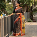 Black Bagru Hand Block Print Kota Doria Cotton Saree, draped and worn by a woman, AI visual of the saree, iTokri