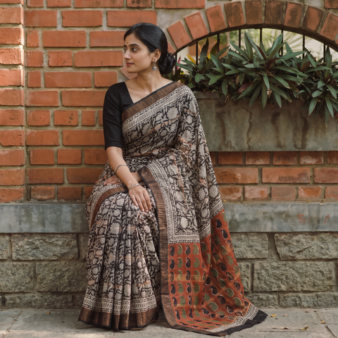 Black Bagru Hand Block Print Kota Doria Cotton Saree, draped and worn by a woman, AI visual of the saree, iTokri