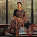 Multicolor Bagru Hand Block Print Kota Doria Cotton Saree, draped and worn by a woman, AI visual of the saree, iTokri