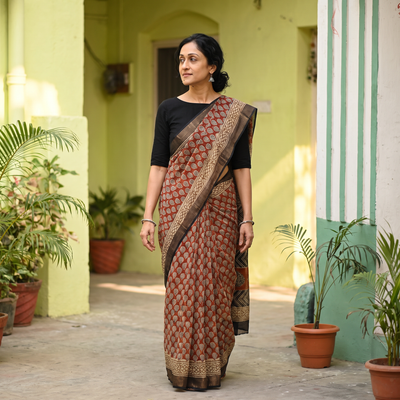 Red Bagru Hand Block Print Kota Doria Cotton Saree, draped and worn by a woman, AI visual of the saree, iTokri