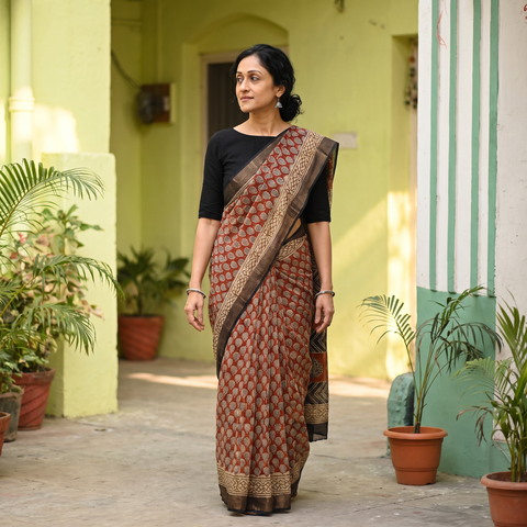 Red Bagru Hand Block Print Kota Doria Cotton Saree, draped and worn by a woman, AI visual of the saree, iTokri