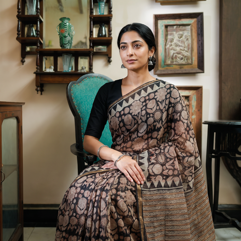 Black Bagru Hand Block Print Kota Doria Cotton Saree, draped and worn by a woman, AI visual of the saree, iTokri