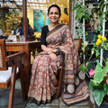 Red Bagru Hand Block Print Kota Doria Cotton Saree, draped and worn by a woman, AI visual of the saree, iTokri