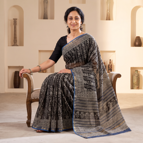 Black Bagru Hand Block Print Kota Doria Cotton Saree, draped and worn by a woman, AI visual of the saree, iTokri