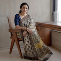 Beige Bagru Hand Block Print Kota Doria Cotton Saree, draped and worn by a woman, AI visual of the saree, iTokri