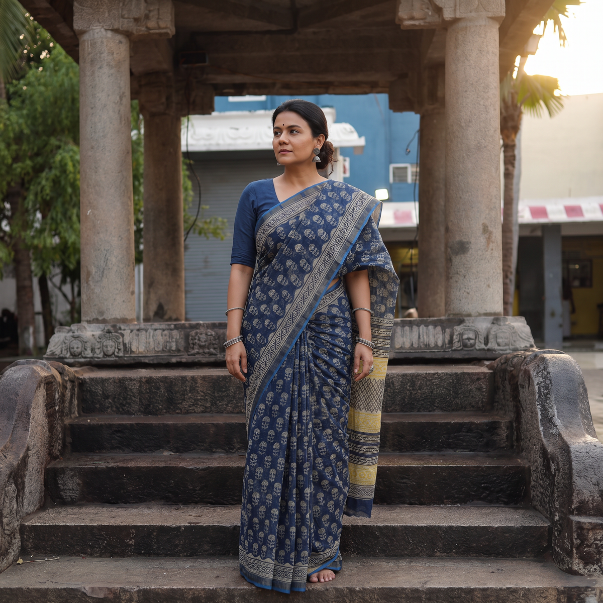 Blue Bagru Hand Block Print Kota Doria Cotton Saree, draped and worn by a woman, AI visual of the saree, iTokri