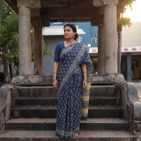 Blue Bagru Hand Block Print Kota Doria Cotton Saree, draped and worn by a woman, AI visual of the saree, iTokri