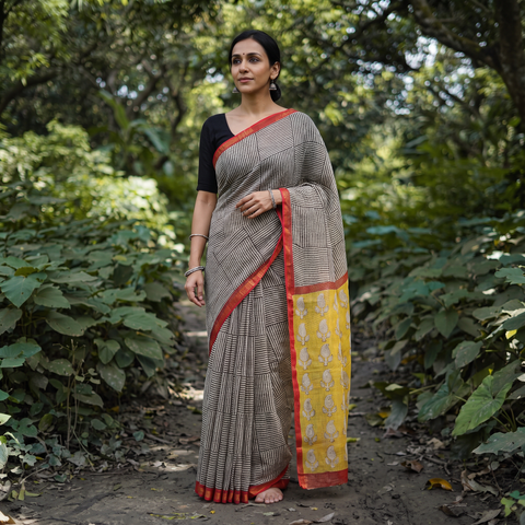 Black Bagru Hand Block Print Kota Doria Cotton Saree, draped and worn by a woman, AI visual of the saree, iTokri