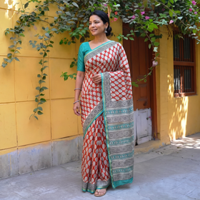 Red Bagru Hand Block Print Natural Dyed Chanderi Silk Saree, draped and worn by a woman, AI visual of the saree, iTokri