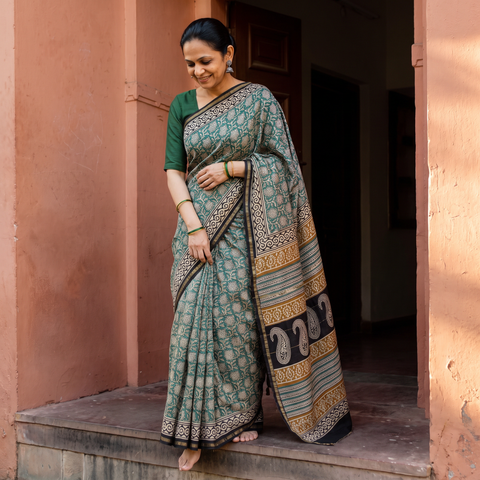Green Bagru Hand Block Print Natural Dyed Chanderi Silk Saree, draped and worn by a woman, AI visual of the saree, iTokri