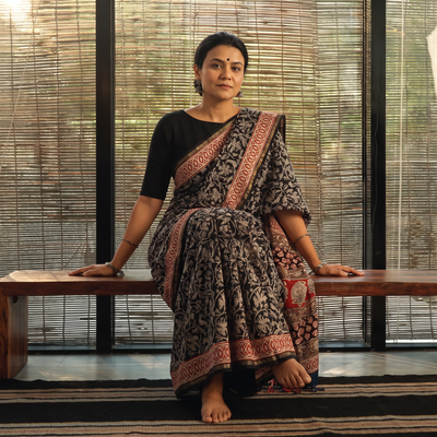 Black Bagru Hand Block Print Natural Dyed Chanderi Silk Saree, draped and worn by a woman, AI visual of the saree, iTokri