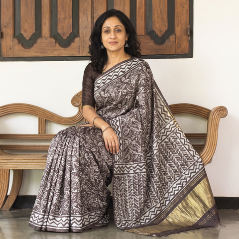 Brown Bagru Hand Block Print Natural Dyed Modal Silk Saree, draped and worn by a woman, AI visual of the saree, iTokri