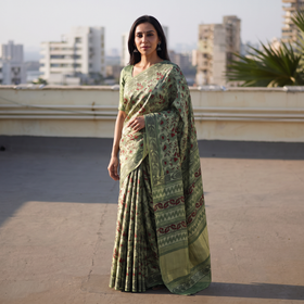 Green Bagru Hand Block Print Natural Dyed Modal Silk Saree, draped and worn by a woman, AI visual of the saree, iTokri