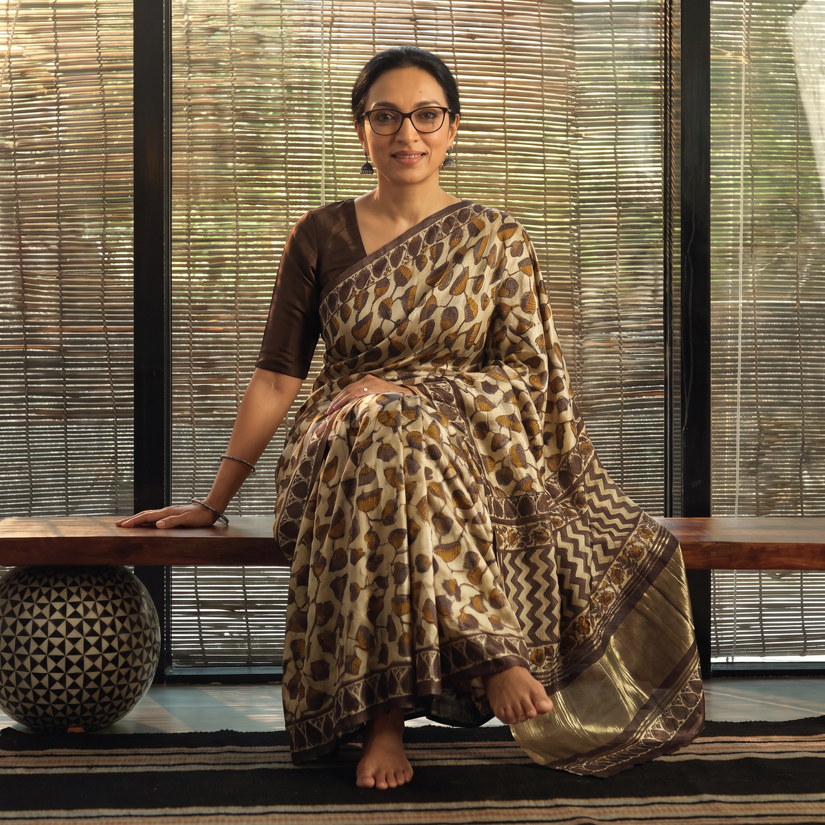Brown Bagru Hand Block Print Natural Dyed Modal Silk Saree, draped and worn by a woman, AI visual of the saree, iTokri