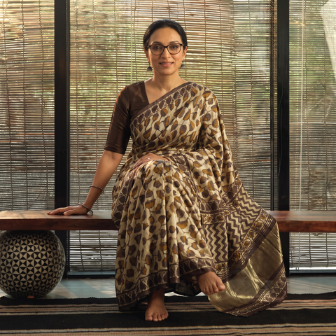 Brown Bagru Hand Block Print Natural Dyed Modal Silk Saree, draped and worn by a woman, AI visual of the saree, iTokri