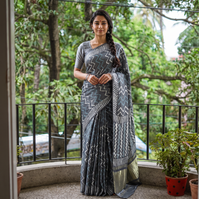 Grey Bagru Hand Block Print Natural Dyed Modal Silk Saree, draped and worn by a woman, AI visual of the saree, iTokri