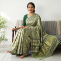 Green Bagru Hand Block Print Natural Dyed Modal Silk Saree, draped and worn by a woman, AI visual of the saree, iTokri