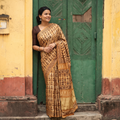 Yellow Bagru Hand Block Print Natural Dyed Modal Silk Saree, draped and worn by a woman, AI visual of the saree, iTokri