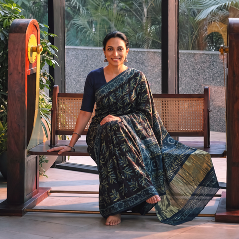 Blue Bagru Hand Block Print Natural Dyed Modal Silk Saree, draped and worn by a woman, AI visual of the saree, iTokri