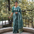 Green Bagru Hand Block Print Natural Dyed Modal Silk Saree, draped and worn by a woman, AI visual of the saree, iTokri
