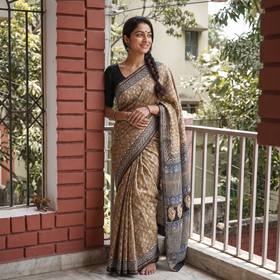 Yellow Bagru Hand Block Print Natural Dyed Mulberry Silk Saree, draped and worn by a woman, AI visual of the saree, iTokri