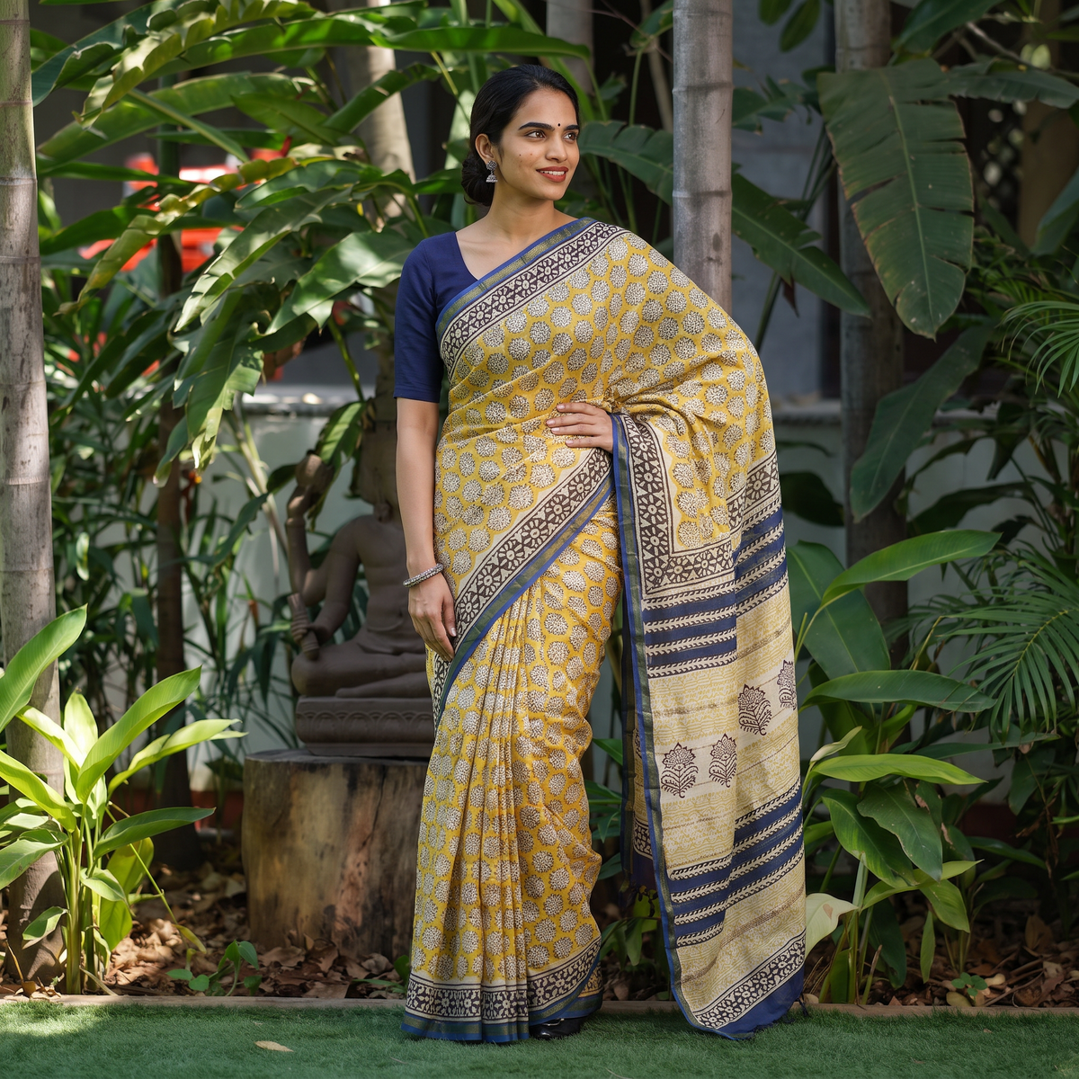 Yellow Bagru Hand Block Print Natural Dyed Mulberry Silk Saree, draped and worn by a woman, AI visual of the saree, iTokri