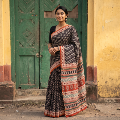 Black Bagru Hand Block Print Natural Dyed Mulberry Silk Saree, draped and worn by a woman, AI visual of the saree, iTokri
