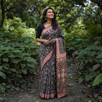 Black Bagru Hand Block Print Natural Dyed Mulberry Silk Saree, draped and worn by a woman, AI visual of the saree, iTokri