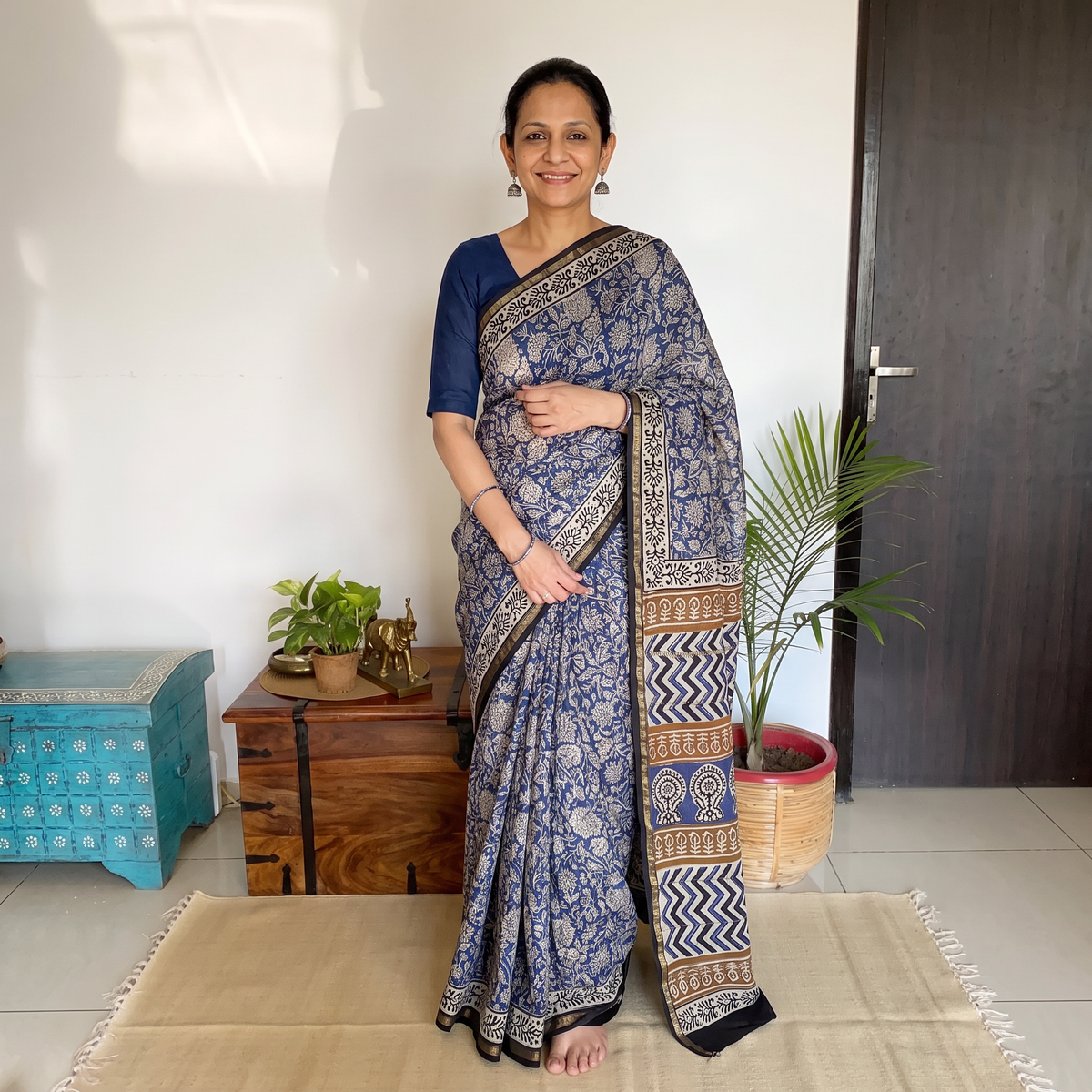 Blue Bagru Hand Block Print Natural Dyed Mulberry Silk Saree, draped and worn by a woman, AI visual of the saree, iTokri