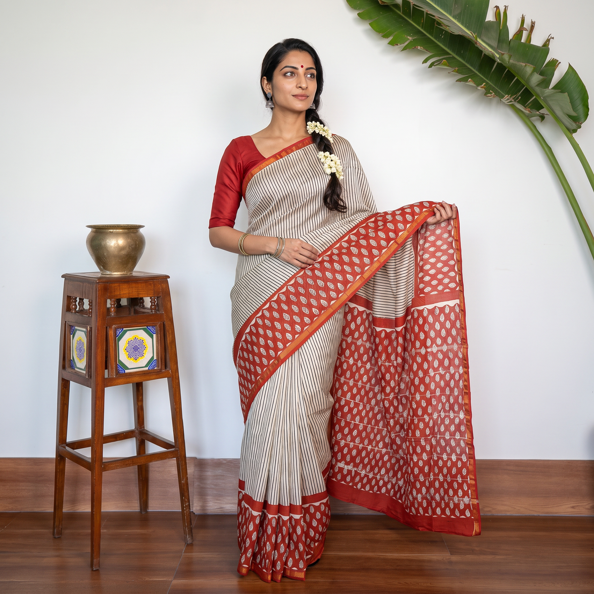 Red Bagru Hand Block Print Natural Dyed Mulberry Silk Saree, draped and worn by a woman, AI visual of the saree, iTokri