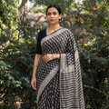 Black Bagru Hand Block Print Pure Mul Cotton Ready To Wear Saree, draped and worn by a woman, AI visual of the saree, iTokri