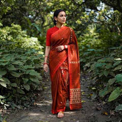 Rust Bamboo Silk Thread Buti Assam Pure Handwoven Saree with Blouse Piece, draped and worn by a woman, AI visual of the saree, iTokri