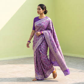 Purple Banarasi Pure Handwoven Georgette Meena Buti Zari Jaal Work Saree, draped and worn by a woman, AI visual of the saree, iTokri