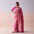 Pink Banarasi Pure Handwoven Georgette Meena Buti Zari Jaal Work Saree, draped and worn by a woman, AI visual of the saree, iTokri
