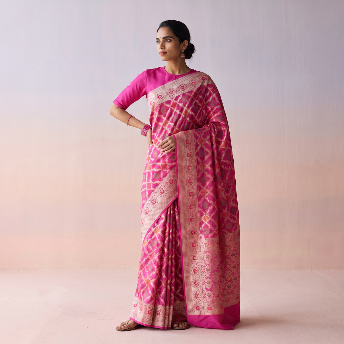 Pink Banarasi Pure Handwoven Georgette Meena Buti Zari Jaal Work Saree, draped and worn by a woman, AI visual of the saree, iTokri