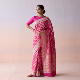 Pink Banarasi Pure Handwoven Georgette Meena Buti Zari Jaal Work Saree, draped and worn by a woman, AI visual of the saree, iTokri