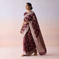 Maroon Banarasi Pure Handwoven Georgette Meena Buti Zari Jaal Work Saree, draped and worn by a woman, AI visual of the saree, iTokri