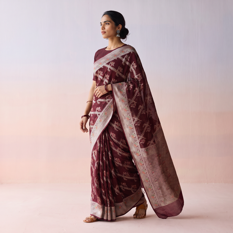 Maroon Banarasi Pure Handwoven Georgette Meena Buti Zari Jaal Work Saree, draped and worn by a woman, AI visual of the saree, iTokri