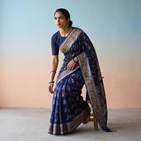 Blue Banarasi Pure Handwoven Georgette Zari Work Saree, draped and worn by a woman, AI visual of the saree, iTokri