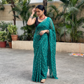 Green Bandhani tie-dye Kota Doria cotton saree, draped and worn by a woman, by artisan Adil Hussain, AI visual of the saree, iTokri
