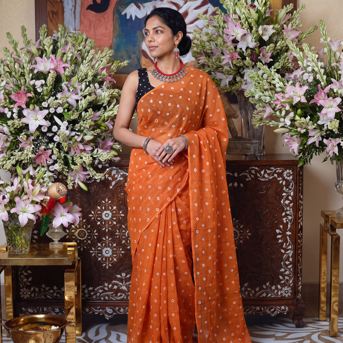 Orange Bandhani tie-dye Kota Doria cotton saree, draped and worn by a woman, by artisan Adil Hussain, AI visual of the saree, iTokri