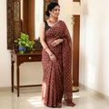 Brown Bandhani tie-dye Kota Doria cotton saree, draped and worn by a woman, by artisan Adil Hussain, AI visual of the saree, iTokri