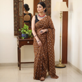 Brown Bandhani tie-dye Kota Doria cotton saree, draped and worn by a woman, AI visual of the saree, iTokri