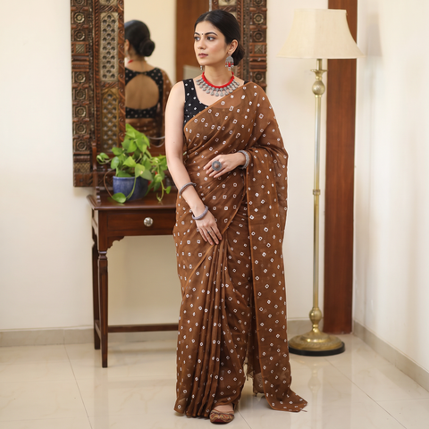 Brown Bandhani tie-dye Kota Doria cotton saree, draped and worn by a woman, AI visual of the saree, iTokri